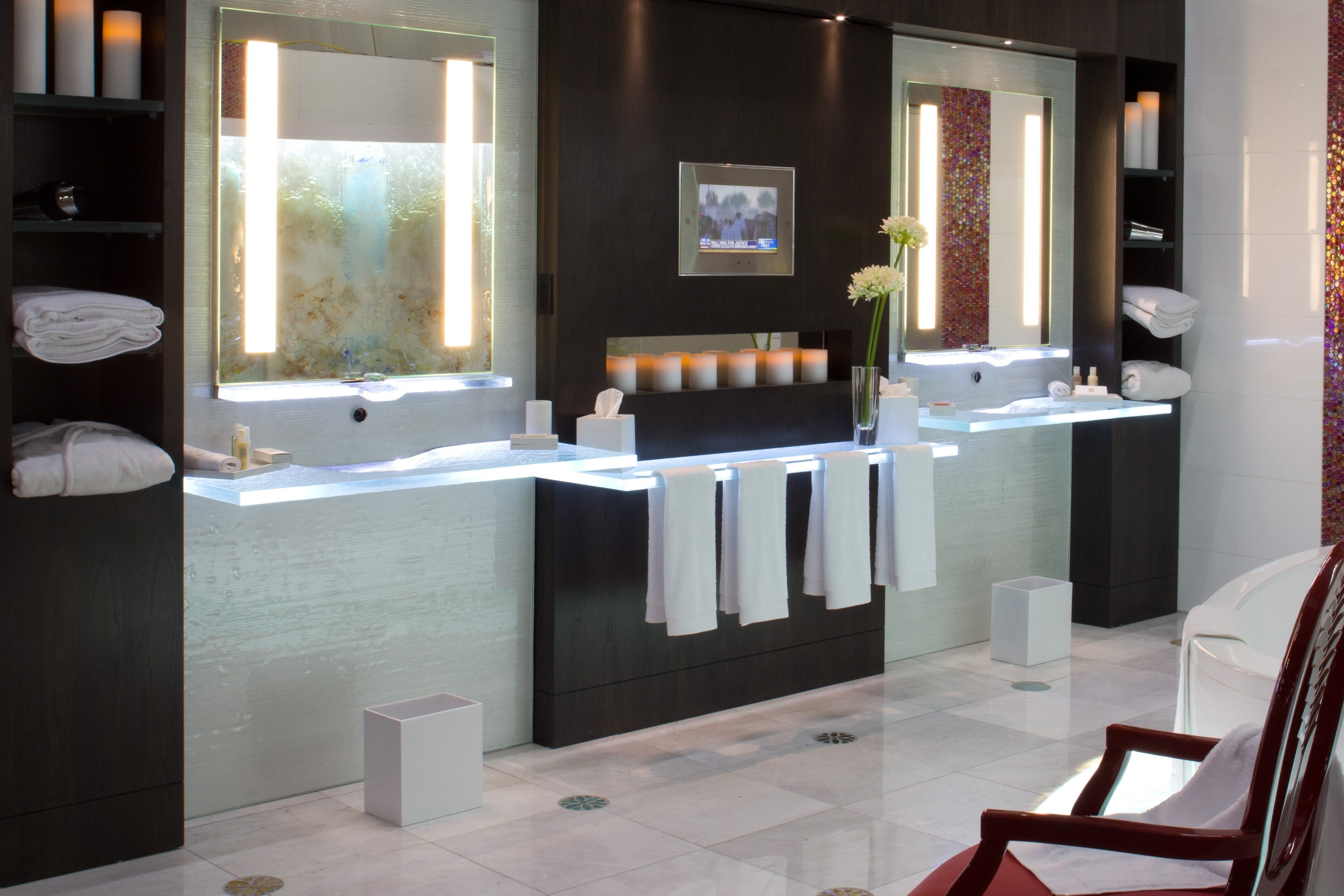 La Source is a fully customized floating glass sink with glass faucet, it is a complete unit pre-assembled aluminum framing in our plant, with all plumbing & electronic systems, back splashes floor to ceiling. Single or double sinks, . 